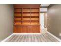 Stylish living room featuring built in shelving, with elegant flooring and ample storage space at 108 Knoll Ct # A, Noblesville, IN 46062
