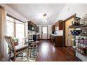 Bright eat-in kitchen featuring a bay window, wooden cabinetry, and stainless steel appliances at 2909 Huntsville Rd, Pendleton, IN 46064