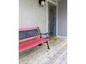 Covered porch with a bench, providing a welcoming entrance to the home at 4214 Woodsage Trce, Indianapolis, IN 46237