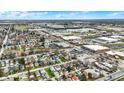 Expansive aerial view showcasing a neighborhood near commercial areas and the Indianapolis Motor Speedway at 4933 Ford St, Indianapolis, IN 46224