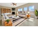Bright living room features a fireplace, built-in shelving, and lots of natural light at 943 Foxglove St, Lebanon, IN 46052