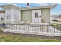 Inviting front porch with seating, perfect for enjoying quiet moments outdoors at 118 W Fordice St, Lebanon, IN 46052