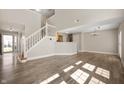 Spacious living room with new flooring, and large windows at 1561 Brookfield Cir, Franklin, IN 46131
