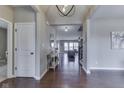 Spacious entryway with gleaming hardwood floors and an open floor plan at 4182 Backstretch Ln, Bargersville, IN 46106
