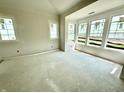 Sun-drenched room with an abundance of windows offering beautiful views at 1463 Crosstie Cir, Westfield, IN 46074