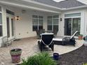 Spacious patio with outdoor seating and beautifully landscaped surroundings at 2460 Collins Dr, Westfield, IN 46074