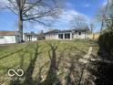 Expansive backyard with grass, shed, and single-Gathering home at 2750 Kristen E Dr, Indianapolis, IN 46218
