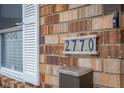 Close-up of the house number '2770' and mailbox on a brick exterior at 2770 Two Worlds Dr, Columbus, IN 47201