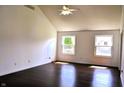 Bright bedroom features vaulted ceiling, beautiful windows with lots of natural light, and hardwood floors at 3513 Berkdale Dr, Columbus, IN 47203