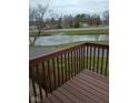 Enjoy a serene view of the water fountain from the private deck at 8955 Stonegate Rd # A, Indianapolis, IN 46227