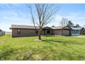 Charming single-story brick home with an attached garage on a sunny day at 153 Terrace Ct, Franklin, IN 46131