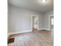 Open-concept living room features hardwood floors and ample natural light at 1911 Wilcox St, Indianapolis, IN 46222