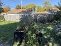 Fenced backyard featuring grass lawn and container at 1952 N Colorado Ave, Indianapolis, IN 46218