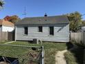 View of the backyard with a fence and an exterior view of the house at 1952 N Colorado Ave, Indianapolis, IN 46218
