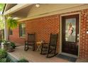 Charming front porch with rocking chairs at 649 E Country Ln, Martinsville, IN 46151