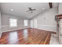 Bright living room with a vaulted ceiling, wood beam and large windows at 901 W 250 N, Lebanon, IN 46052