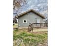 Backyard featuring a wooden deck and green grass at 1100 Graham St, Franklin, IN 46131