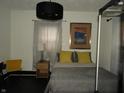 Cozy bedroom featuring a comfortable bed, modern lamp, and decorative artwork at 1153 W 29Th St, Indianapolis, IN 46208