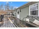 Inviting back porch with comfortable seating, perfect for outdoor relaxation and enjoyment at 15473 Martha St, Fortville, IN 46040