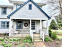 Charming home featuring a quaint front porch, perfect for relaxing and enjoying the outdoors at 3030 N 600 E, Lebanon, IN 46052