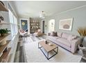 Inviting living room with stylish decor and hardwood floors, perfect for entertaining or relaxing at 1627 E 8Th St, Anderson, IN 46012