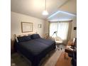 A cozy main bedroom featuring a comfortable bed, soft lighting, and a serene ambiance at 3259 Eddy Ct, Indianapolis, IN 46214