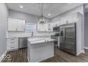 Modern kitchen with stainless steel appliances, a center island, and custom cabinetry at 337 E Minnesota St, Indianapolis, IN 46225