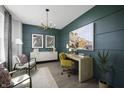 Stylish home office with accent wall, modern lighting and comfortable seating at 781 Rose Garden Way, Westfield, IN 46074