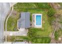 Aerial view of a house with a backyard pool, surrounded by lush greenery at 8414 Anchorage Ct, Indianapolis, IN 46236