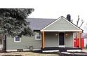 Charming home featuring an inviting covered porch with wooden accents at 150 E Troy Ave, Indianapolis, IN 46225