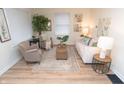 Cozy living room with neutral tones, stylish furnishings, and ample natural light at 1957 N Colorado Ave, Indianapolis, IN 46218