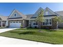 Lovely single-Gathering home with a brick facade, complemented by a well-maintained lawn and landscaping at 19771 Sutton Ter, Westfield, IN 46074