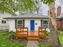 Inviting exterior view of a home featuring a cozy front porch at 3559 Carrollton Ave, Indianapolis, IN 46205