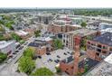 Brick apartment buildings with parking are updated and move-in ready in a vibrant setting at 624 E Walnut St # 21, Indianapolis, IN 46204