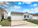 Delightful single-Gathering home with a white garage door, blue shutters, and well-maintained yard at 16838 Aulton Dr, Noblesville, IN 46060