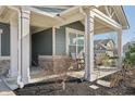 Covered front porch seating area at 1972 Mobley Dr, Westfield, IN 46074