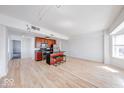 Open-concept apartment featuring hardwood floors and a modern island kitchen at 230 E 9Th St # 502, Indianapolis, IN 46204