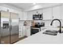 Bright kitchen featuring stainless steel appliances, quartz countertops, and ample storage at 431 W Main St, Lizton, IN 46149
