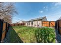 Spacious fenced backyard with a patio area perfect for outdoor entertaining at 839 Bough St, Whiteland, IN 46184