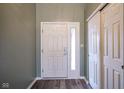 Entryway featuring durable flooring and access to coat closet at 1163 Randall Way, Brownsburg, IN 46112
