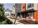 Modern condo exteriors with brick and siding and inviting front entrances at 1811 Livery Way, Indianapolis, IN 46202
