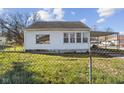This charming home is vinyl sided and has replacement windows at 2501 Reformers Ave, Indianapolis, IN 46203