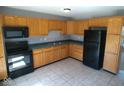 Functional kitchen features ample cabinet space, modern appliances, and a practical layout for cooking at 5523 Epperson Ct, Indianapolis, IN 46221