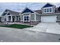 Beautiful home featuring a two-car garage and meticulously landscaped front yard at 6222 Fairview Dr, McCordsville, IN 46055