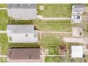 An overhead view displaying property boundaries, backyard features, and neighborhood layout at 831 Wallace Ave, Indianapolis, IN 46201