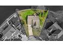 Aerial view of a cozy home with a fenced backyard, surrounded by lush greenery at 10407 Stillwell Ct, Avon, IN 46123