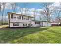 Charming two-story home with well-kept lawn at 11921 Westwood Dr, Carmel, IN 46033