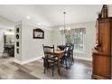 Traditional dining room featuring modern flooring and ample natural light at 2143 Sunderland Dr, Martinsville, IN 46151