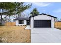 Charming single-Gathering home featuring attached garage, and well-manicured lawn at 4921 Cottonwood N Ct, Columbus, IN 47203
