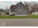 Beautiful home with a well-maintained lawn and inviting curb appeal in a quiet neighborhood at 501 W Pearl St, Trafalgar, IN 46181
